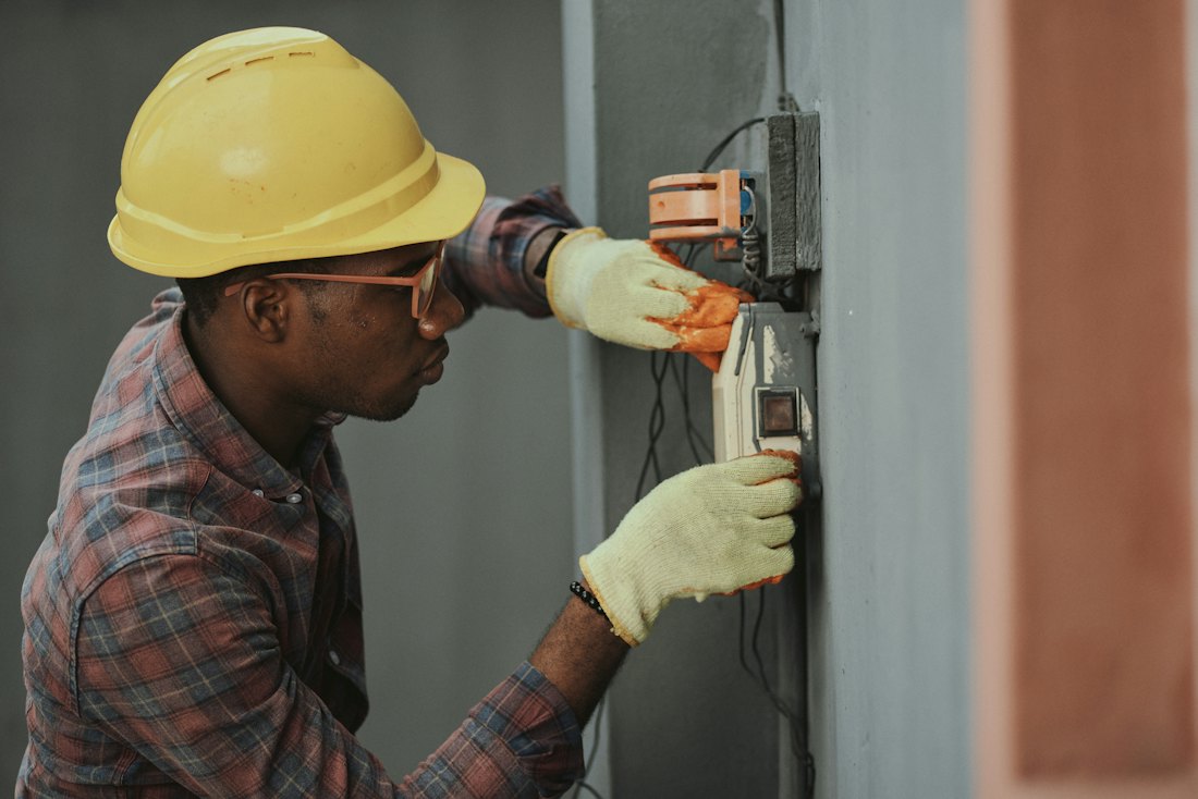 Electrician working on a distribution board